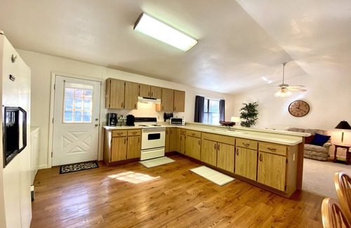 Bryson City Cabin | RIVERFRONT Retreat with HOT TUB on Nantahala River