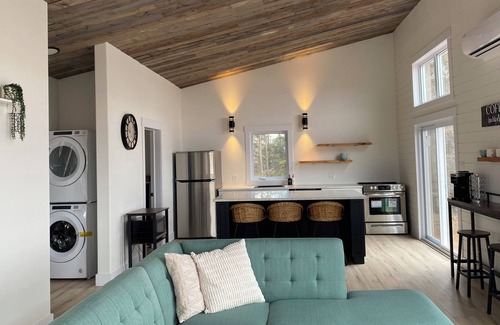 Alberton Cottage | Rivers End Retreat located on cascumpec river. Private hot tub and bunk house.