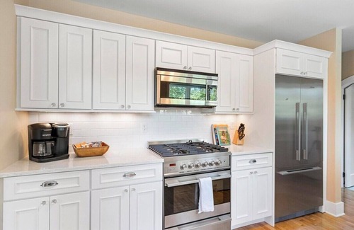 Boyne City House | Riversbye: Historical: 3 ensuite bedrooms: Kayaks