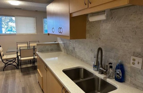 Sunnyside House | Riverside Bliss: 3-Bed Basement Suite