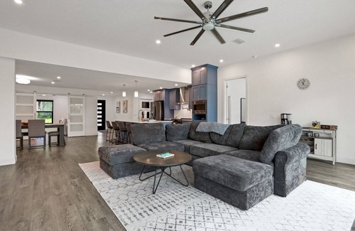 Palm Harbor House | Riverside luxury home with covered pool - Your ultimate retreat for relaxation