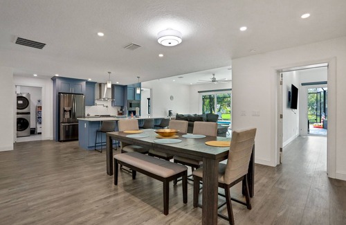 Palm Harbor House | Riverside luxury home with covered pool - Your ultimate retreat for relaxation