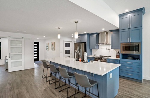 Palm Harbor House | Riverside luxury home with covered pool - Your ultimate retreat for relaxation