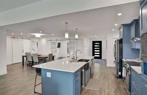 Palm Harbor House | Riverside luxury home with covered pool - Your ultimate retreat for relaxation