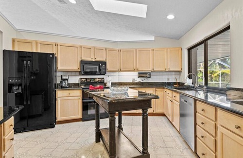 Beau Rivage West House | Riverside Retreat: 4BR/3BA with Private Dock and Boat Lift