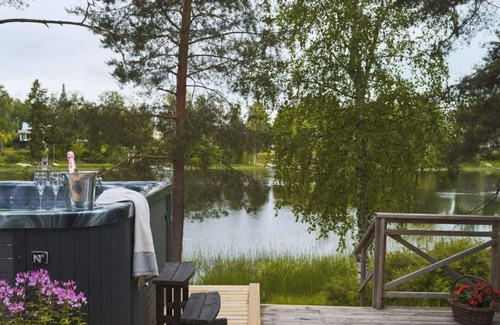 Kouvola Villa | Riverside retreat for up to 12 guests