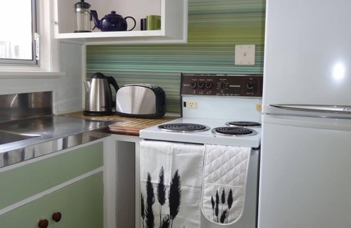 Nelson House | Riversong City Retreat - right on the edge of town