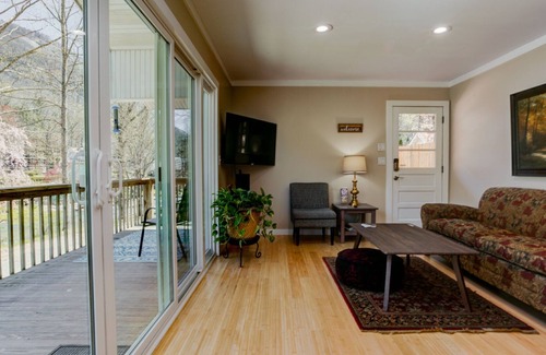 Bat Cave House | Rocky Riverside Escape with hot tub & game room in Bat Cave/Chimney Rock!