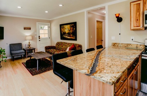 Bat Cave House | Rocky Riverside Escape with hot tub & game room in Bat Cave/Chimney Rock!