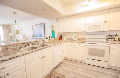 Panama City Beach Condo | Romance on the beach! VERY near Pier Park! 4 FREE Beach Chairs!