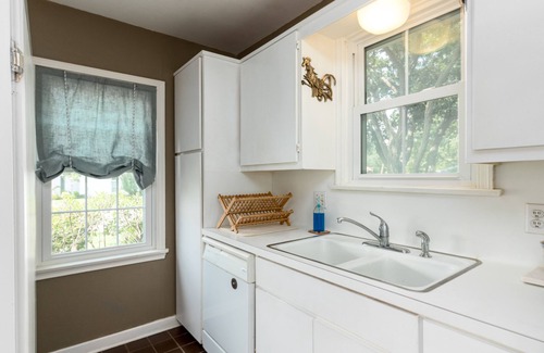 Bay Area House | Romantic 1938 Bay House Steps from Ocean Dr Porches, Gardens & Coastal Charm