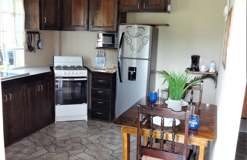 St. George's Apartment | Romantic getaway, with a great view of both sunrise and sunset over the mountain