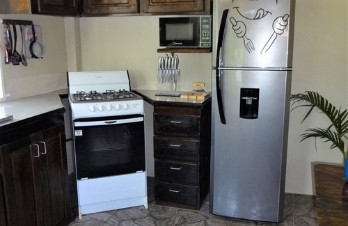 St. George's Apartment | Romantic getaway, with a great view of both sunrise and sunset over the mountain