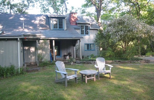 Woodstock Cottage | Romantic + historic artist cottage with storybook charm in private woods!