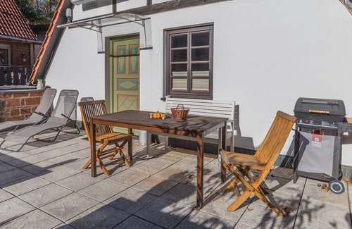 Dimbach House | Romantic holiday home with a large sun terrace and fireplace