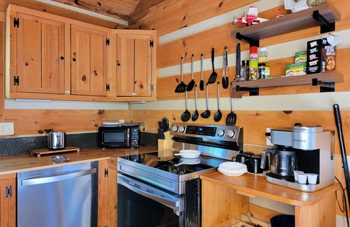 Sevierville Cabin | Romantic, Private Cabin in Smokies w/view, Hot Tub and Firepit!