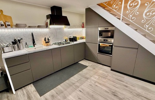 Civitella San Paolo House | Rome Castle House with Meals & Wine, within the interior of a medieval castle.