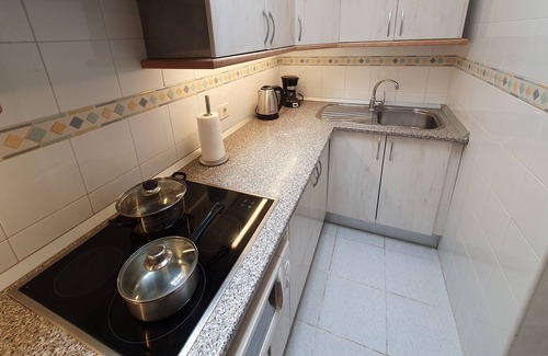 Balito Apartment | Rooftop sun lounge with ocean views and pool access!