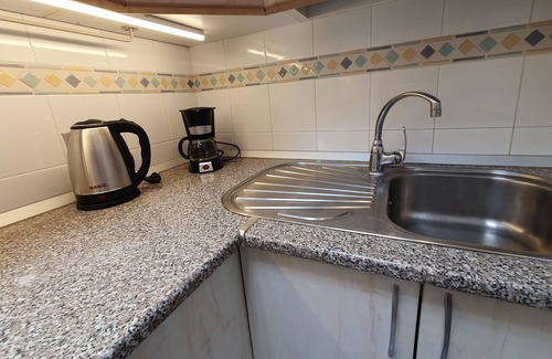 Balito Apartment | Rooftop sun lounge with ocean views and pool access!