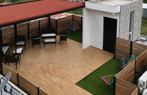 San Agustin de las Juntas House | Rooftop w/mountain view & Waterfall pool. 7min to airport -15min to downtown