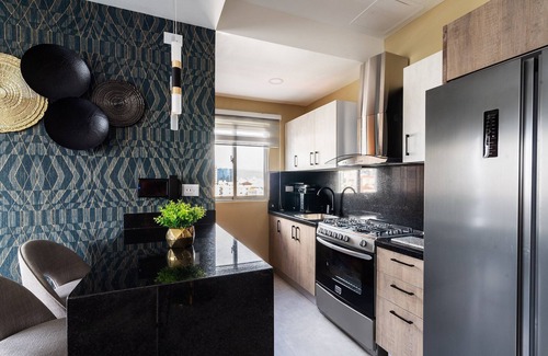 Yolanda Morales Condo | ★RooftopPool-CityViews-Gym-WiFi-A/C-1BR-YellowKey★