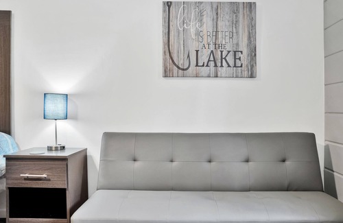 Houghton Lake Hotel | Room #1: Updated King Suite w/small couch