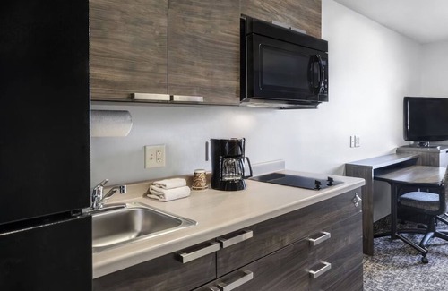 Garner Hotel | Room Close to White Deer Park Nature Center & Garner Performing Arts Center!