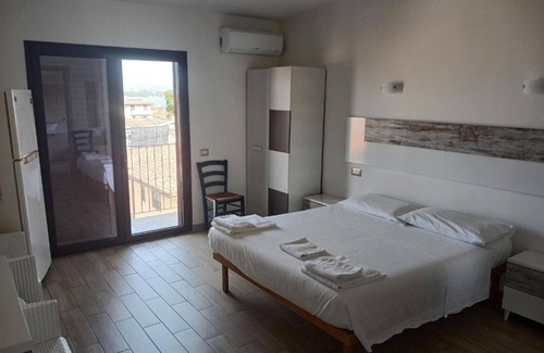 Girasole House | Room 'Junior Suite Marisa' with Balcony, Wi-Fi and Air Conditioning