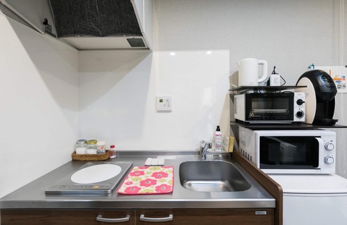 Nakagyo Ward Apartment | Room on the first floor with a separate Japanesestyle room kitchen and 4 Japanesestyle futons/Kyoto Kyōto