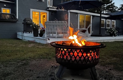 Sebago House | Roomy 3 bedroom with fireplace & wood-burning stove steps away from Sebago Lake