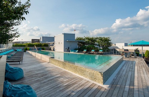 Buzzard Point Apartment | Roomy Navy Yard 1BR w/W/D, Roof BBQ & Gym, near Nats Park by Blueground