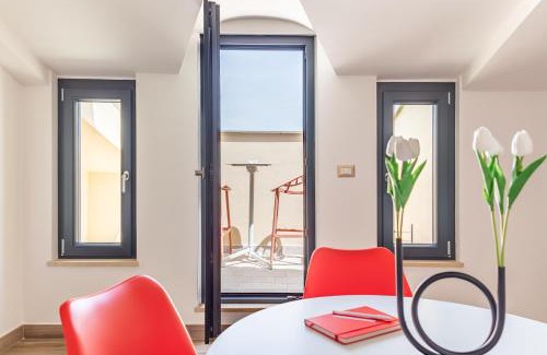 Marta Apartment | Rosso Rubino - Mansarda Vista Lago a Marta