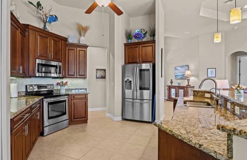 Cape Coral House | Royal Sereni Tee - Cape Royal Golf Community