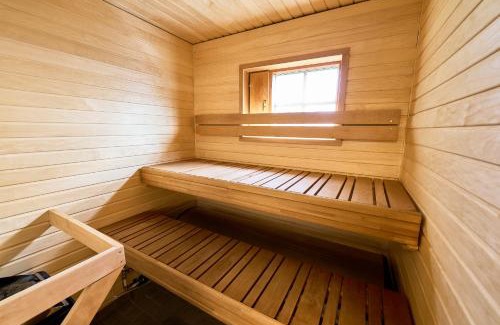 Rukatunturi Apartment | Rukan Havu - Ski-in cabin with sauna & fireplace, 100m to slopes