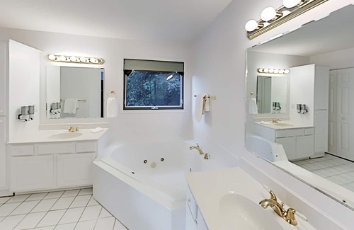 Stonecrest House | Rumbling Bald Resort getaway with 2 living areas, foosball & golf course views