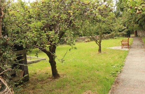 Llangefni House | Rural Hideaway with Hot Tub, Orchard & Games Room