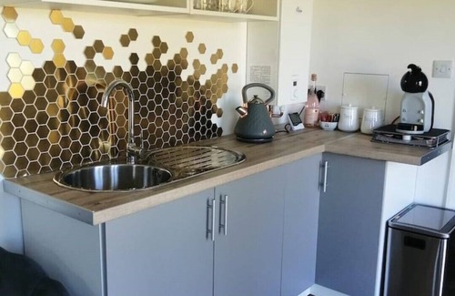 Bury St Edmunds Cabin | Rural Solitary Cabin with deck. In wildflower Meadow. Overlooking nature reserve