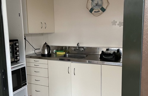 Waihi Beach Cabin | Rustic and comfortable, walk to beach and town