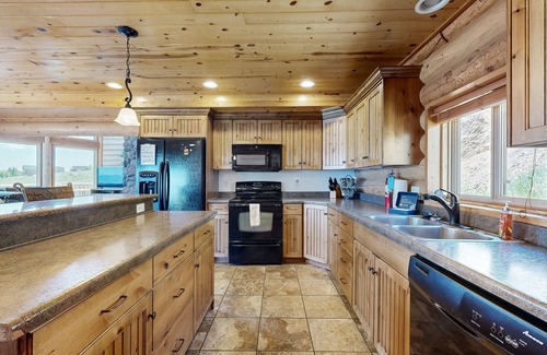 Harbor Village Cabin | Rustic Bear Lake cabin with endless views, deck & tables, fireplace, internet