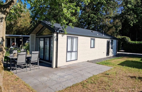 Municipality of Epe Apartment | Rustic Chalet `Edelhert` Amidst the Veluwe Forest