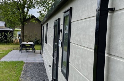 Municipality of Epe Apartment | Rustic Chalet `Edelhert` Amidst the Veluwe Forest