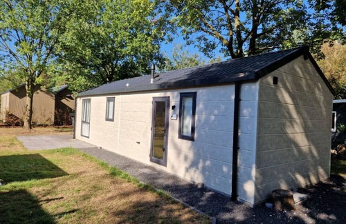 Municipality of Epe Apartment | Rustic Chalet `Edelhert` Amidst the Veluwe Forest