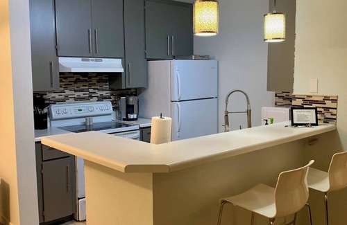 Woodland Springs Condo | Rustic Farmhouse Old Town Condo w/Patio & Pool