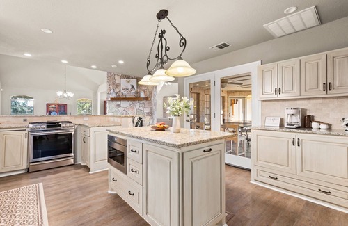 New Braunfels House | Rustic Farmhouse with Backyard Tiki Paradise | Private Pool, Tiki Bar, Ping Pong, Fire Pit & Games