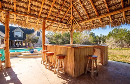 New Braunfels House | Rustic Farmhouse with Backyard Tiki Paradise | Private Pool, Tiki Bar, Ping Pong, Fire Pit & Games