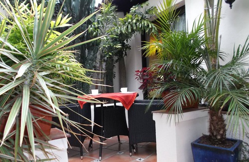 El Guincho Apartment | Rustic holiday home with small patio-terrace