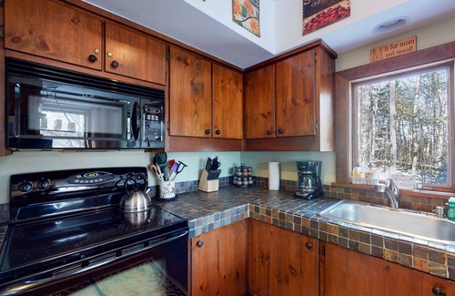 Plymouth House | Rustic home with a private hot tub, fireplace, cable, & washer/dryer