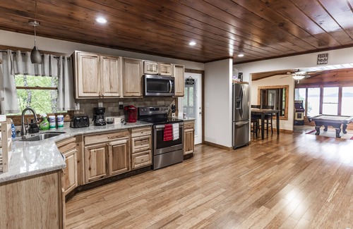 Sevierville Cabin | Rustic Lakefront Cabin near Smokies w/Hot Tub, Firepit, Pool Table + Views!