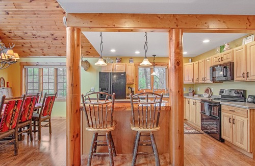 Necedah House | Rustic lakefront home with shared dock & boat slip, game room & stunning gazeebo
