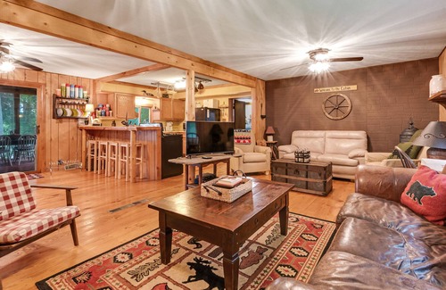 Presque Isle House | Rustic Lakeside Home with Dock, Firepit, Lake Views, and Screened-In Porch